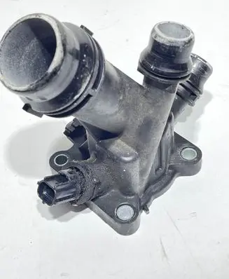 Thermostat/thermostat housing