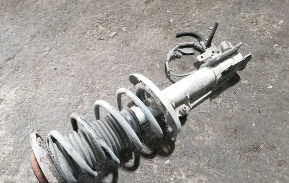 Opel Vectra C Front shock absorber with coil spring