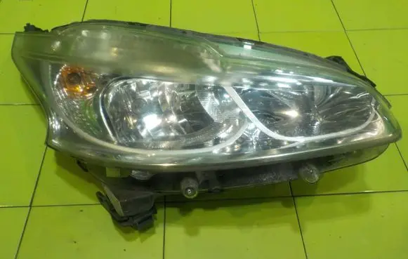 Peugeot 208 I Headlight/headlamp 9802221380