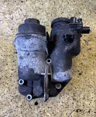 Volvo XC90 Oil filter mounting bracket 30677920