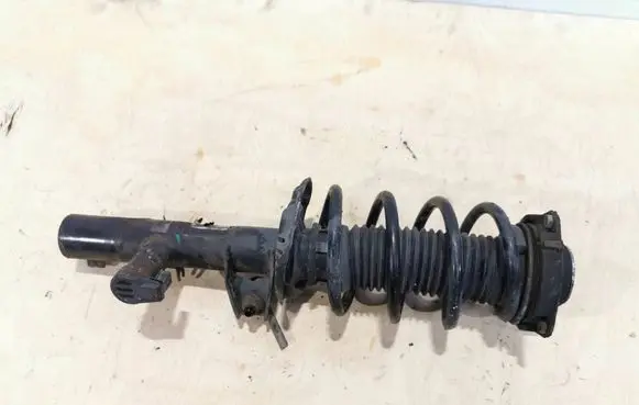 Volkswagen Scirocco Front shock absorber with coil spring 1T0413031HC E4604603 MN3630