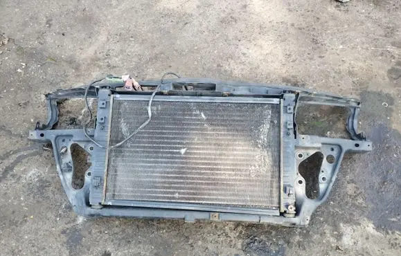 Radiator support slam panel
