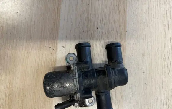 Coolant heater control valve