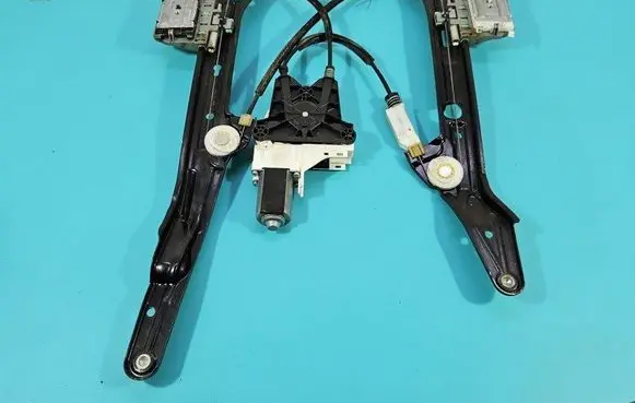 Rear door window regulator with motor