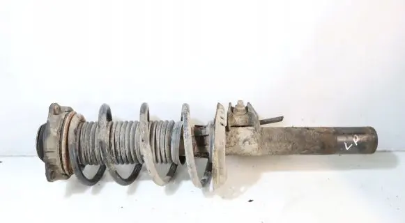 Volkswagen Golf V Front shock absorber with coil spring
