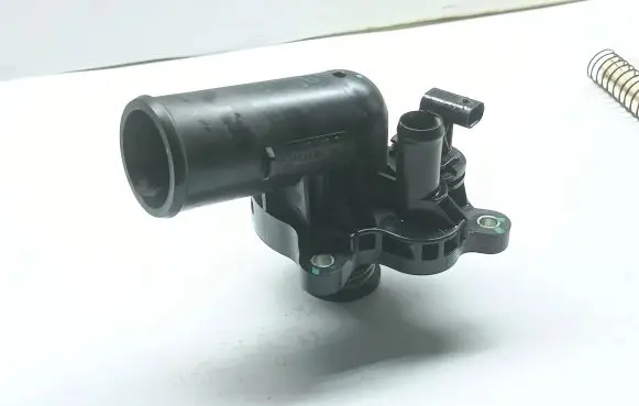 Thermostat/thermostat housing