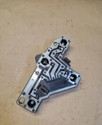 Tail light bulb cover holder
