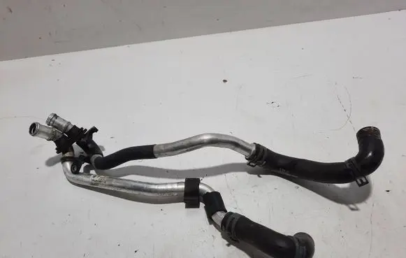 Volkswagen Touareg II Engine coolant pipe/hose 7P0819911E 7P0819857E