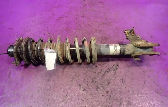 Nissan Micra Front shock absorber with coil spring 