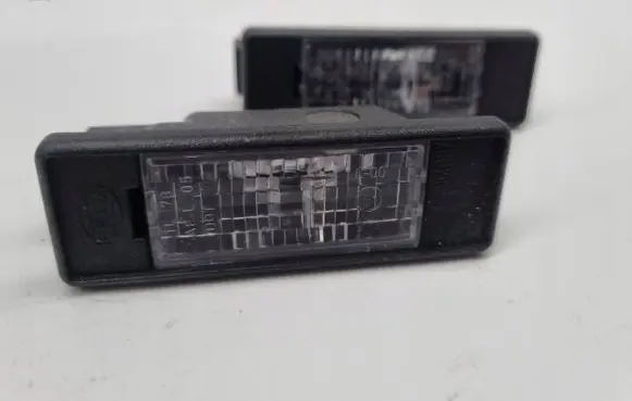 Nissan Primera Number plate light 2KA008224