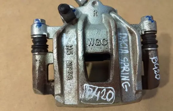 Dacia Spring Front brake caliper 410009315R