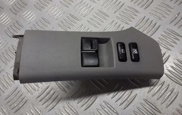 Toyota Yaris Front door window switch trim 74232-0D110