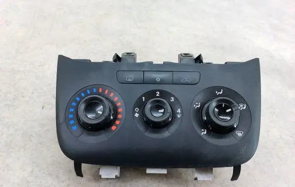 Fiat Punto Evo Climate control/heater control trim 7355042610DENSO