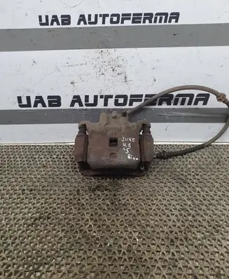 Nissan Juke I F15 Front brake caliper