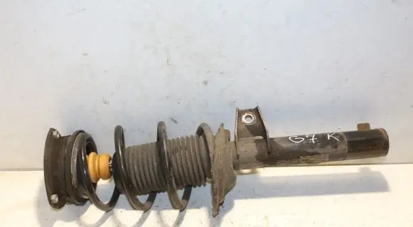 Volkswagen Golf VII Front shock absorber with coil spring 5Q0413023FJ