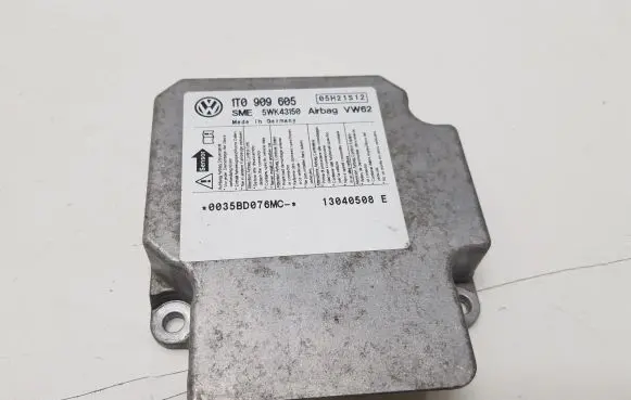 Volkswagen Touran I Airbag control unit/module 1T0909605