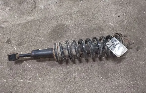 Front shock absorber with coil spring