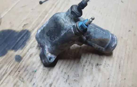 Thermostat/thermostat housing