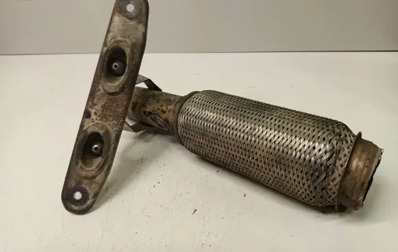 Volkswagen Touran I Exhaust flexible connection 1K0253097