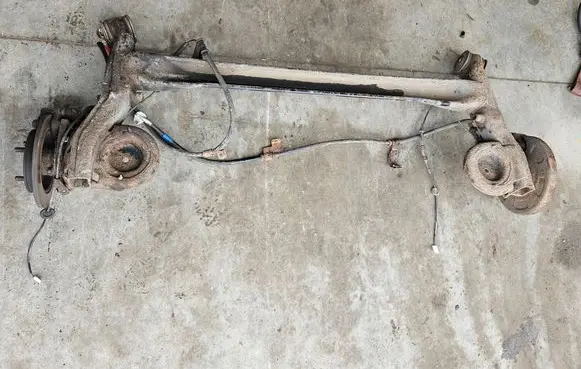 Hyundai i10 Rear axle beam 551000X000
