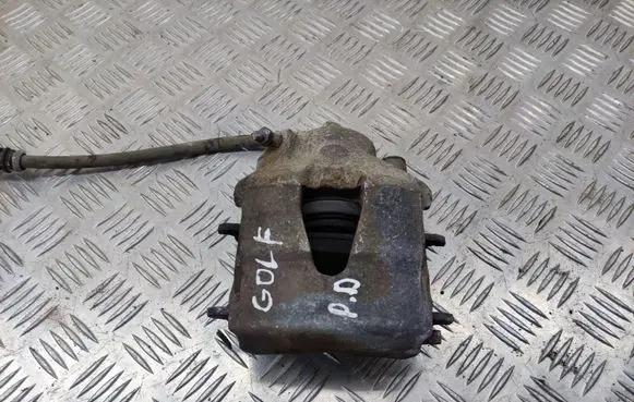 Volkswagen Golf VI Front brake caliper