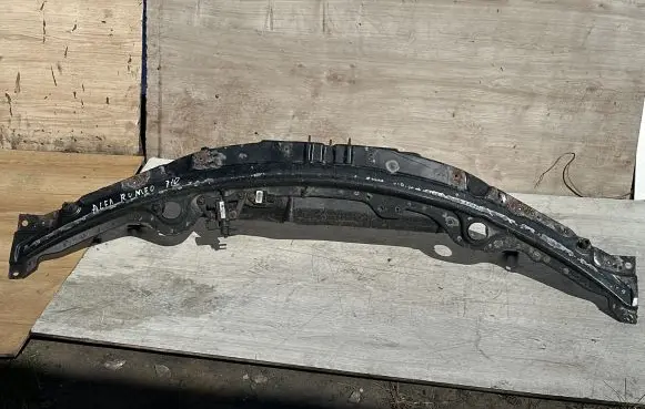 Top upper radiator support slam panel