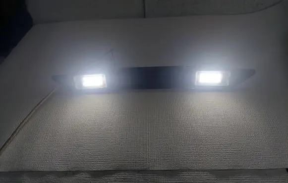 Audi A6 S6 C6 4F Trunk door license plate light bar 8E0827657H