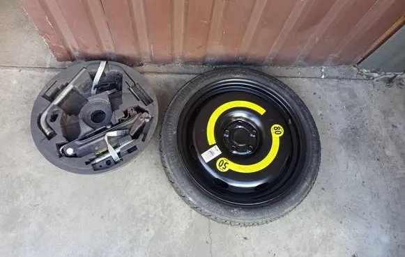 Volkswagen Golf V R18 spare wheel 1K0601027B