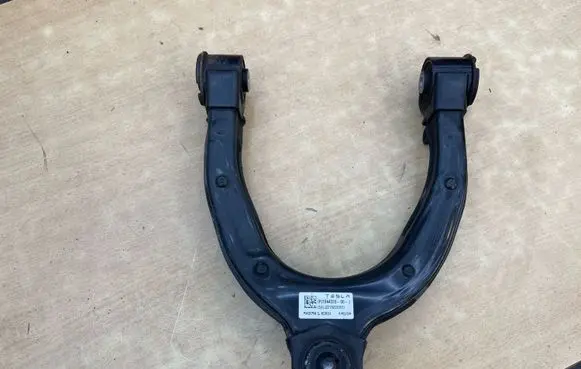 Tesla Model 3 Front upper control arm/wishbone 104432600J