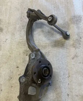 Front wheel hub spindle knuckle