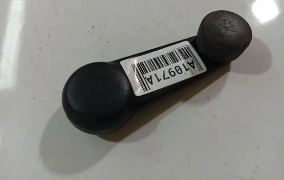 Nissan Micra Front door window winding handle 