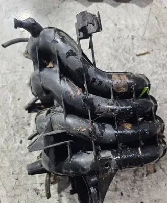 Volkswagen Polo III 6N 6N2 6NF Intake manifold 036129711