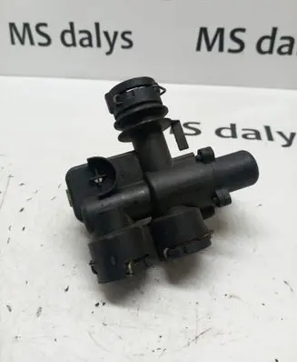 Coolant heater control valve