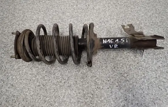 Nissan Almera N16 Front shock absorber with coil spring