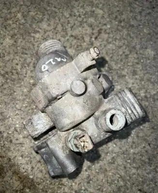 Thermostat/thermostat housing