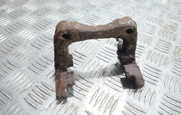 Volkswagen Golf V Brake caliper pad carrier rear 