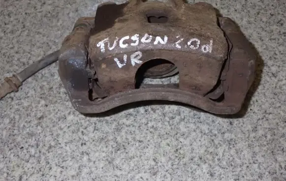 Hyundai Tucson JM Front brake caliper