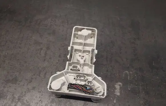 Tail light bulb cover holder