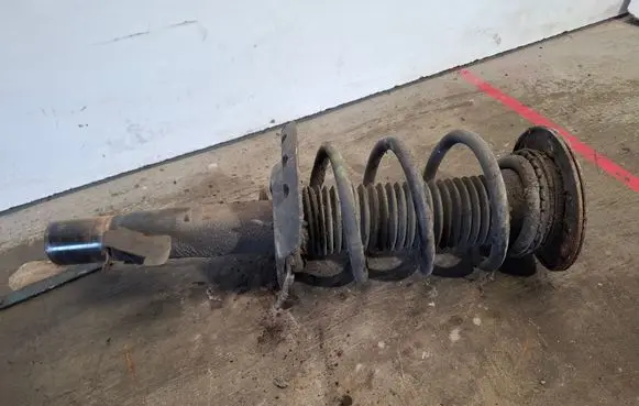 Volvo V60 Front shock absorber with coil spring 31406002