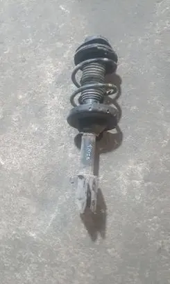 Subaru Outback Front shock absorber with coil spring