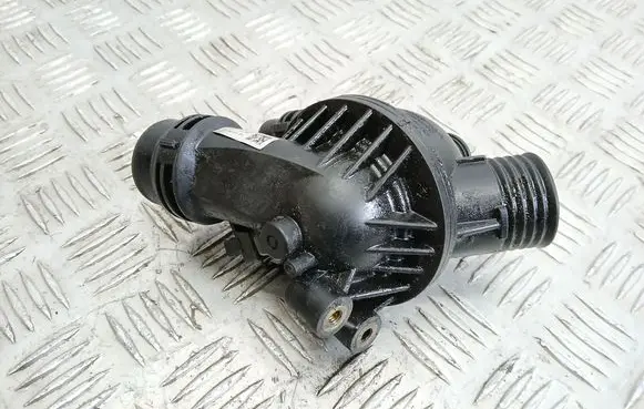 Thermostat/thermostat housing
