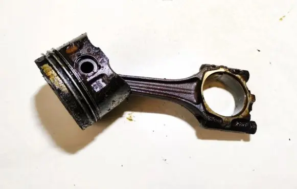 Volkswagen Golf IV Piston with connecting rod 027b