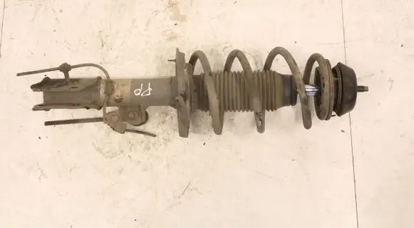 Front shock absorber with coil spring