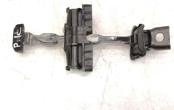 Front door check strap stopper