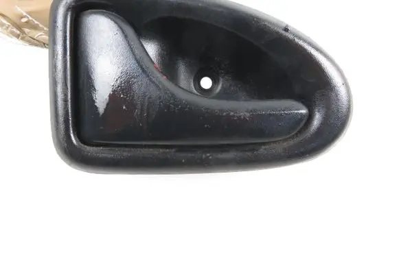 Dacia Logan I Rear door interior handle trim 7700830078