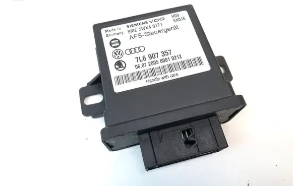 Volkswagen Touareg I Light module LCM 7L6907357