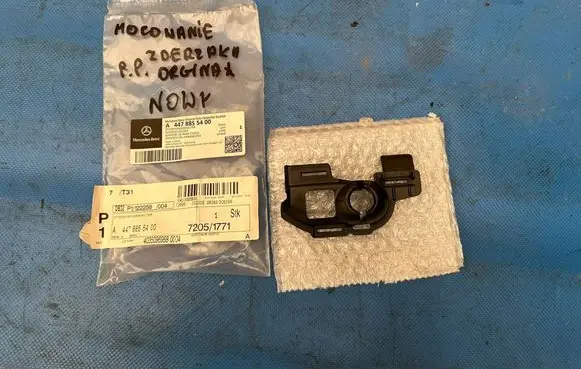 Front bumper mounting bracket