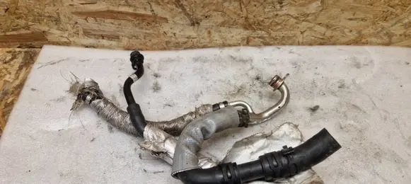 Volkswagen Golf VII Engine coolant pipe/hose 06K21065R