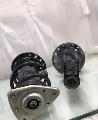 Citroen Berlingo Front shock absorber with coil spring 9836057980