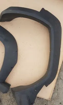 Rear bumper trim bar molding
